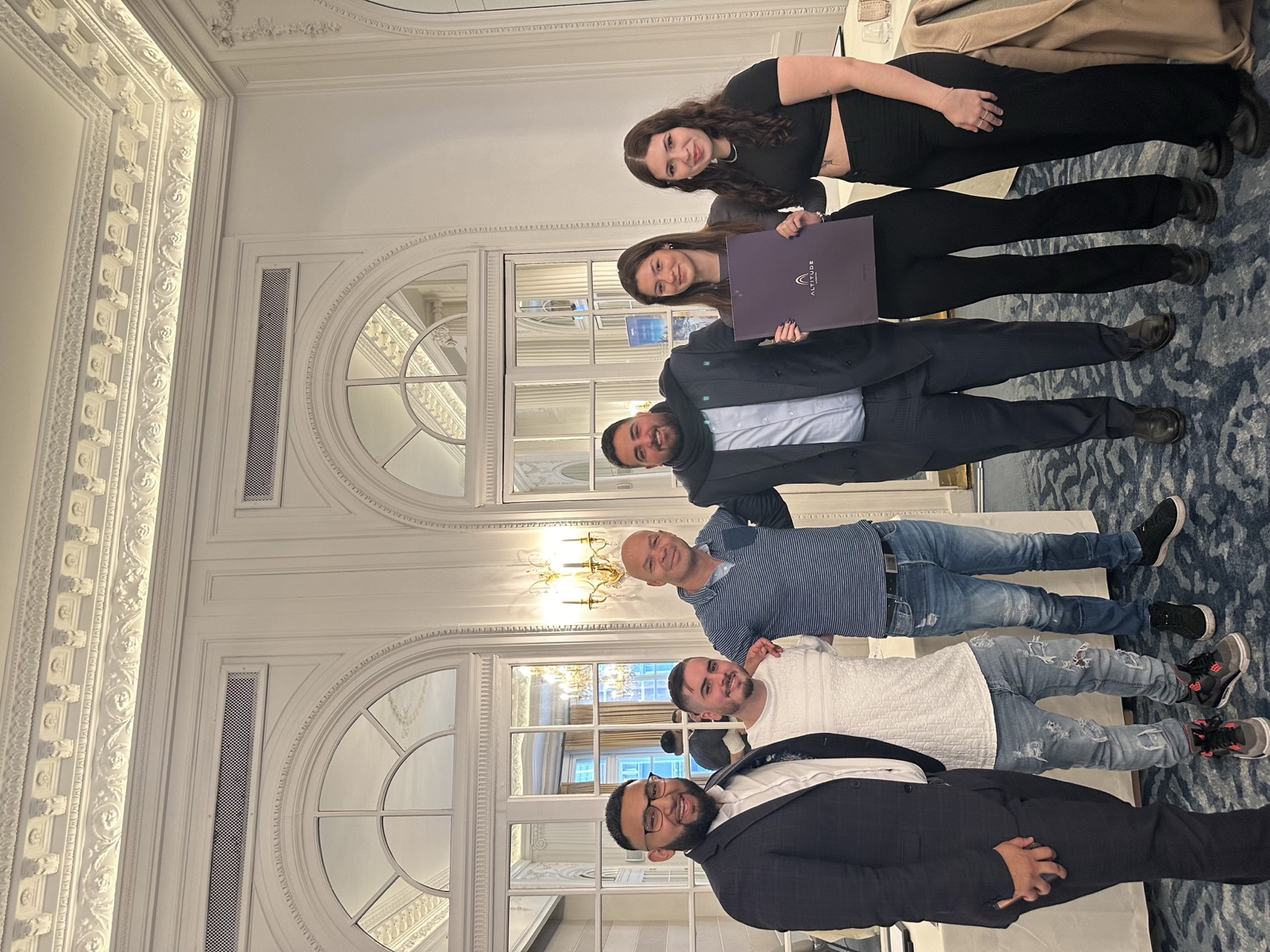 Tazz Miah with a group of clients at a DAMAC launch event in London